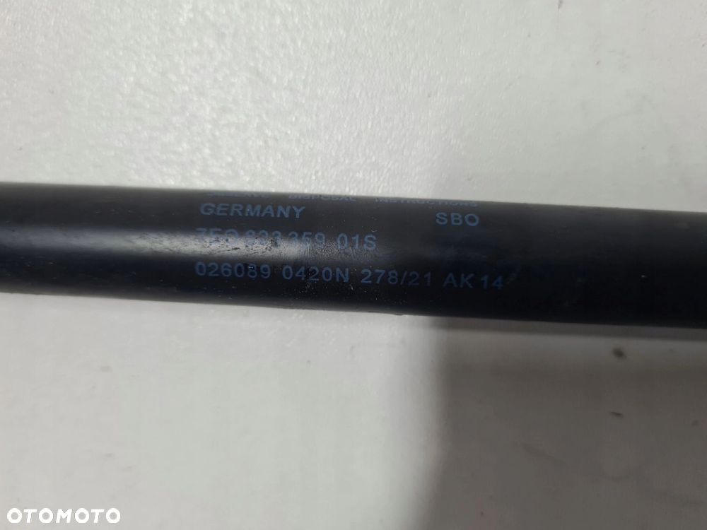 VW T6.1 siłownik gazowy maski przód 7E0823359 - 2