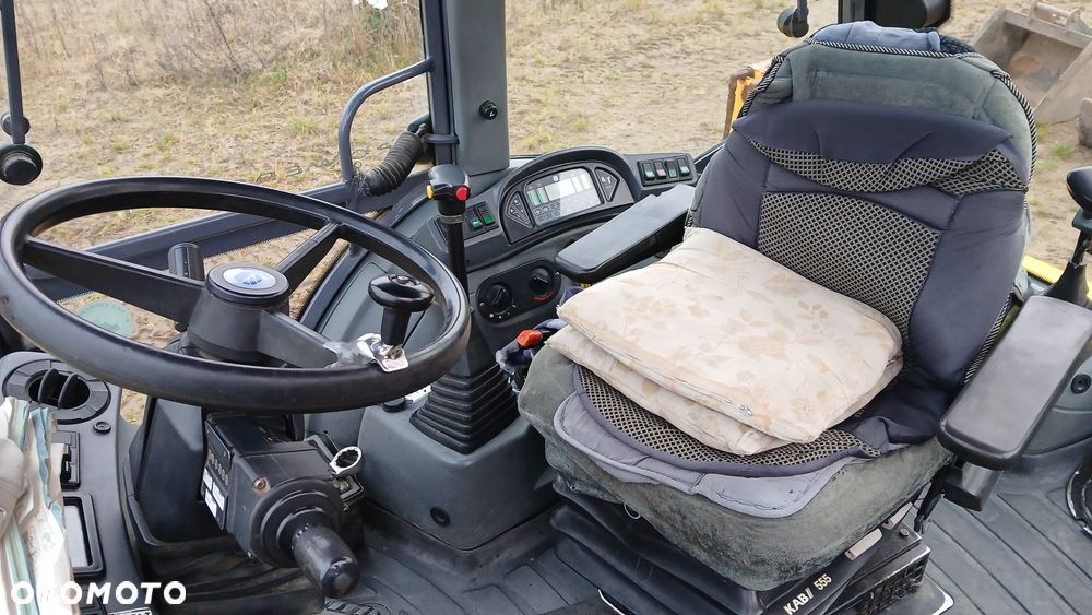 New Holland LB 115 - 24