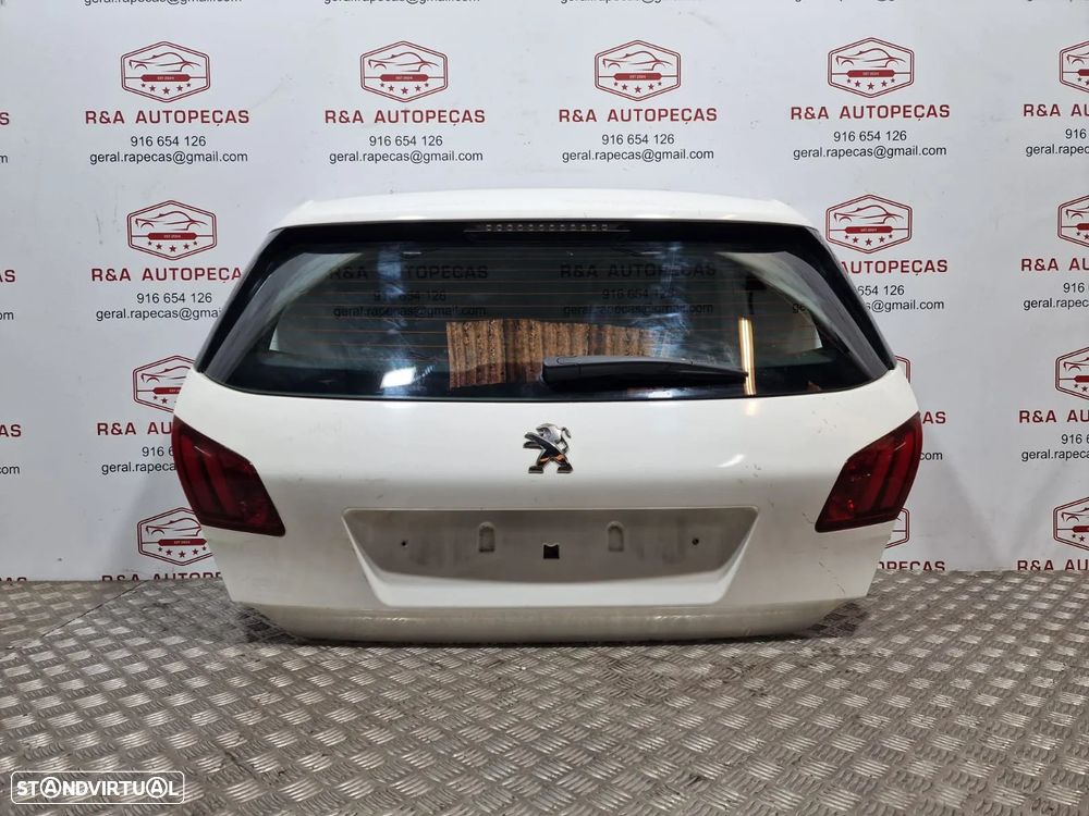 Tampa da Mala Peugeot 308 2015 carro 5 portas - 1
