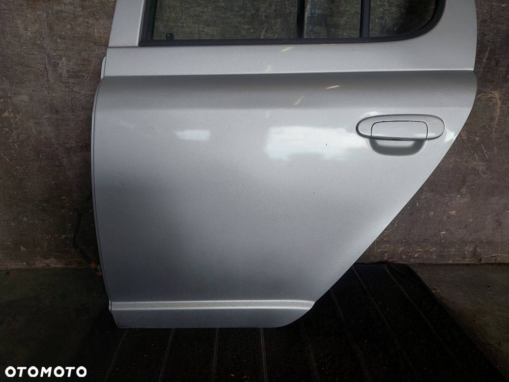 DRZWI KOMPLETNE LEWY TYŁ TOYOTA YARIS I 1E7 ID: 238230 - 2
