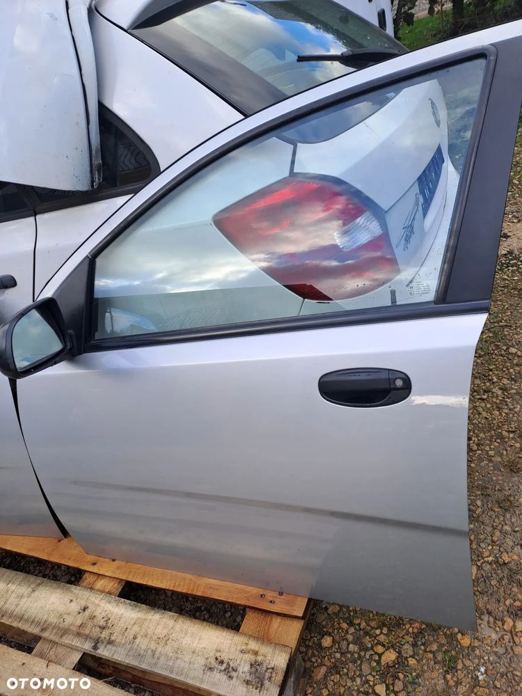 Chevrolet Aveo T250 HB 5D drzwi klapa bagażnika zderzak kod lakieru 92U - 10