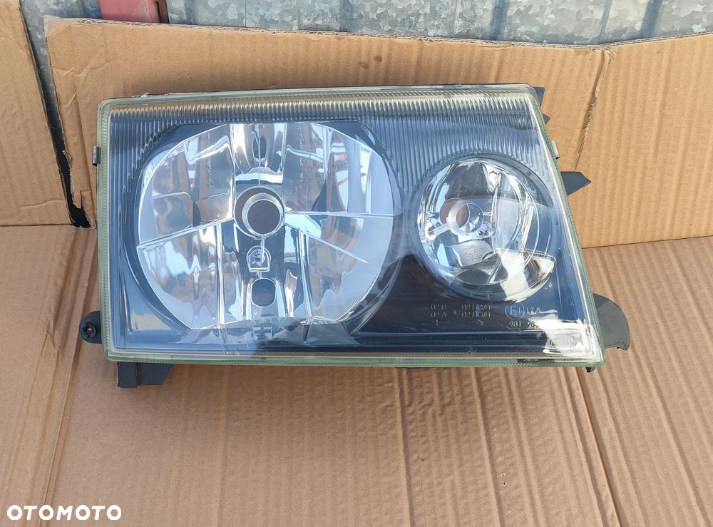 Reflektor Prawy Lampa Prawa szkło ramka Nissan Terrano II Lift - 1
