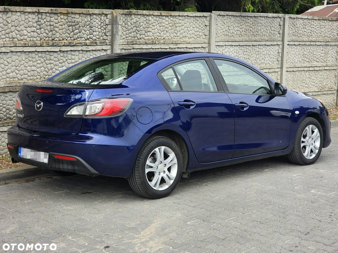 Mazda 3 2.0 MZR DISI Edition - 8