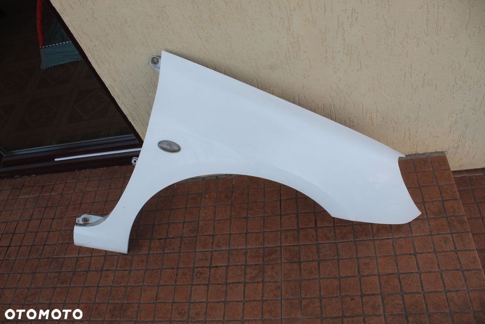 BŁOTNIK PRAWY PRZEDNI PRZÓD PEUGEOT 307 - 1