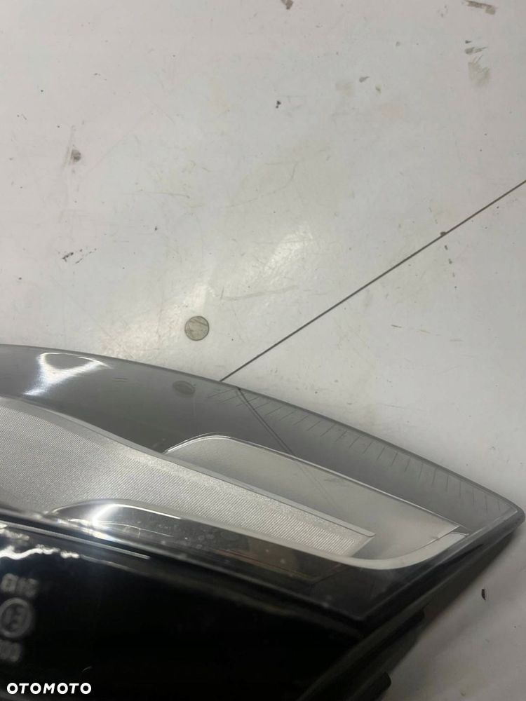 307 023 427 Reflektor Audi A6 S6 C6 4F PRZÓD LEWY - 16
