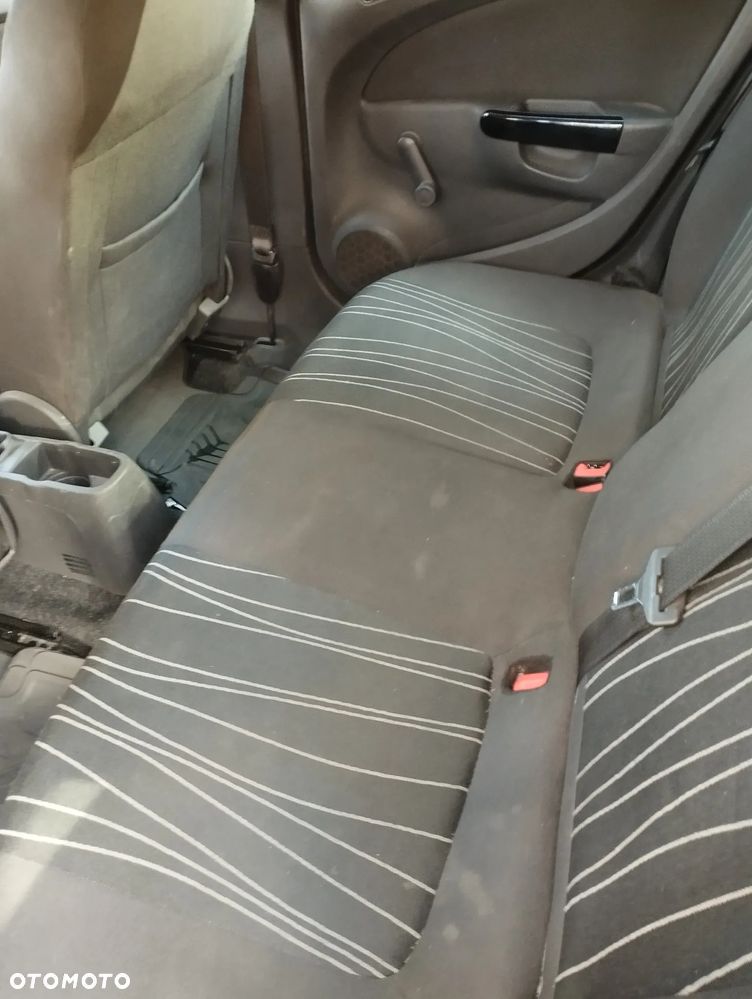 Opel Corsa 1.2 16V Enjoy - 11