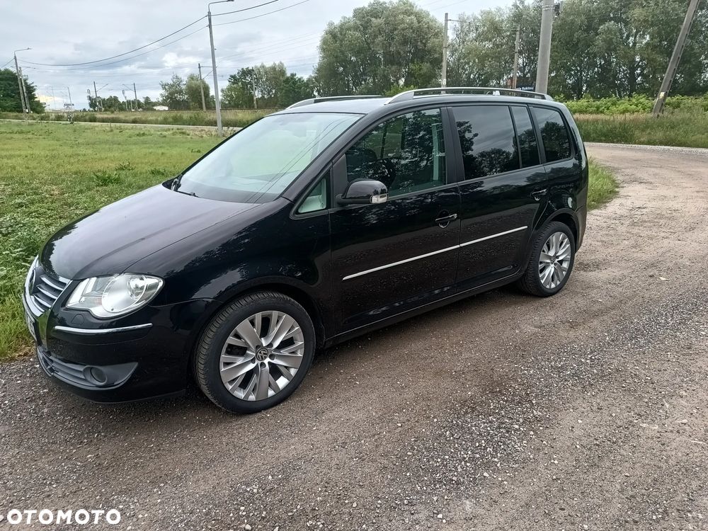 Volkswagen Touran 1.4 TSI DSG Highline - 1