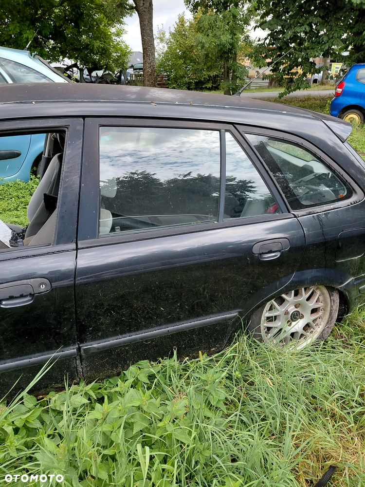 części DRZWI przód lewe TYŁ prawe lewe 16W MAZDA 323F 2002r 1.5 benzyna hatchback - 2