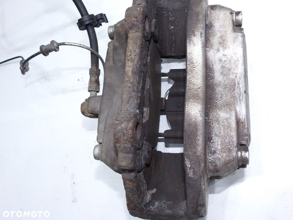 ZACISK HAMULCOWY PRAWY PRZÓD MERCEDES ML W163 5.0 - 4