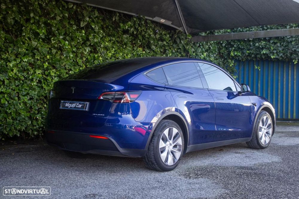 tesla model-y ver-long-range-tra-o-integral - 8