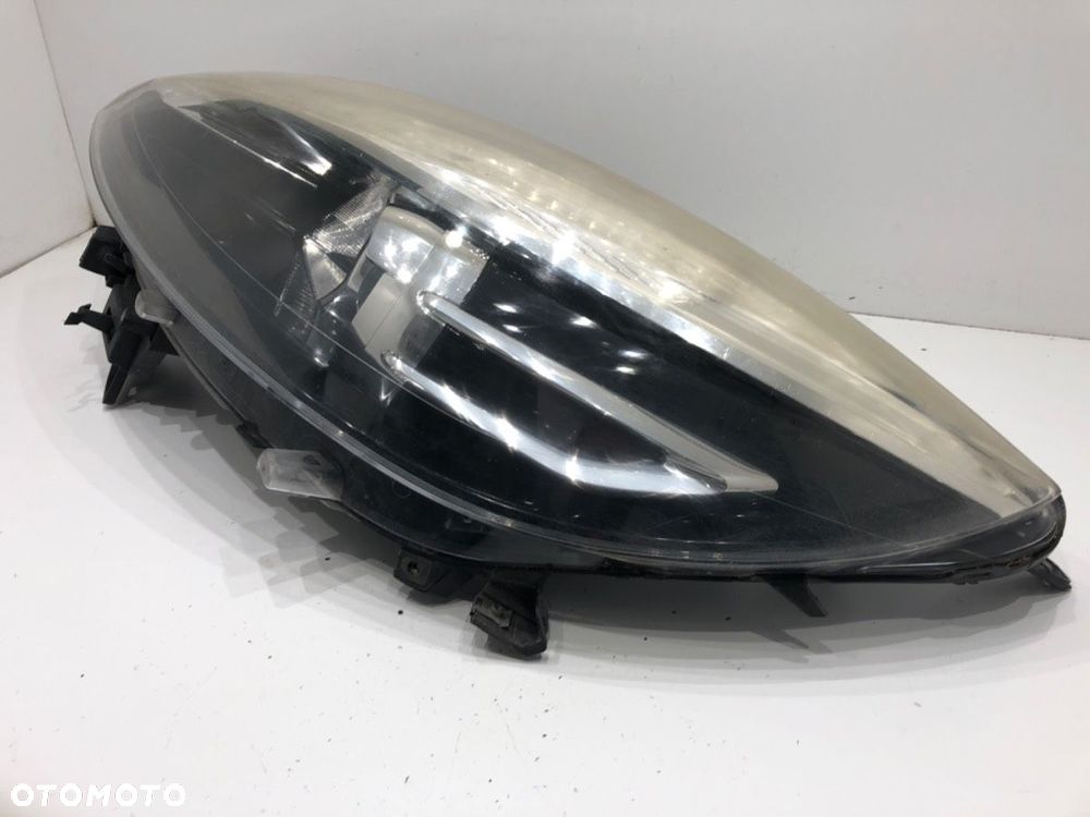 REFLEKTOR LEWY PRZÓD  RENAULT SCÉNIC III (JZ0/1_) 2008 - 2022 1.6 dCi (JZ00, JZ12) 96 kW [130 KM] - 2