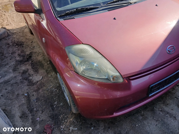 daihatsu sirion II 05/10 maska pokrywa silnika klapa bagażnika zderzak lampa reflektor pas przedni stop lampy
