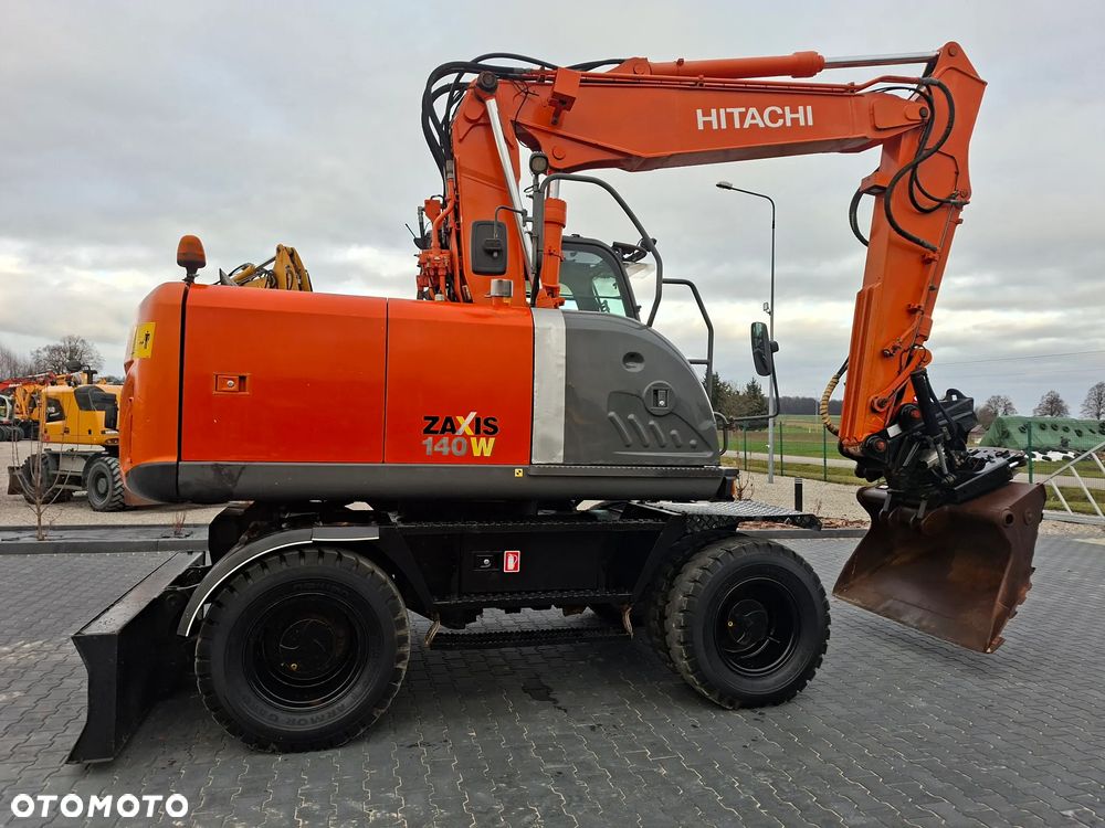 Hitachi ZX140 ROTOTILT - 7
