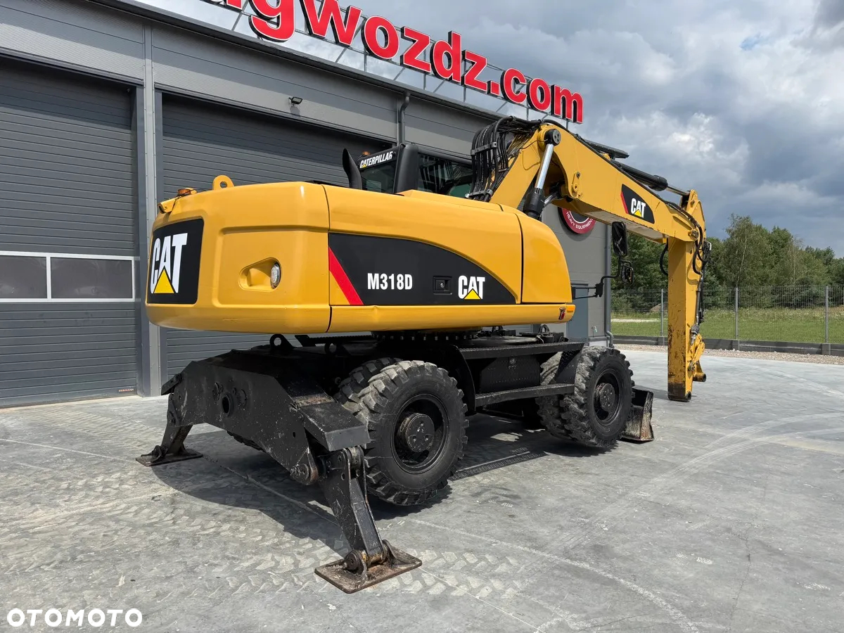 Caterpillar M318D - 4