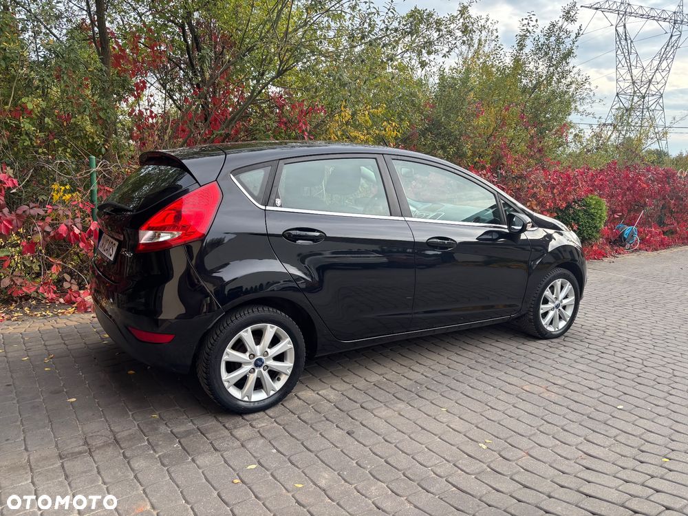 Ford Fiesta 1.4 Ghia - 7
