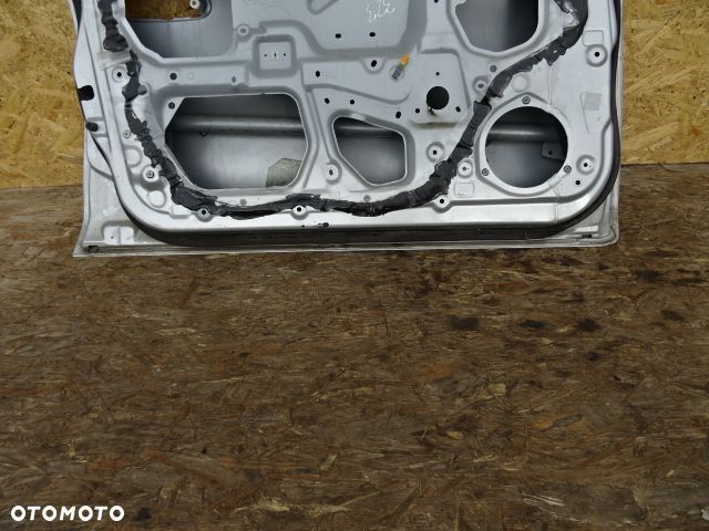 DRZWI LEWY PRZÓD LEWE PRZEDNIE MAZDA 323 - 9