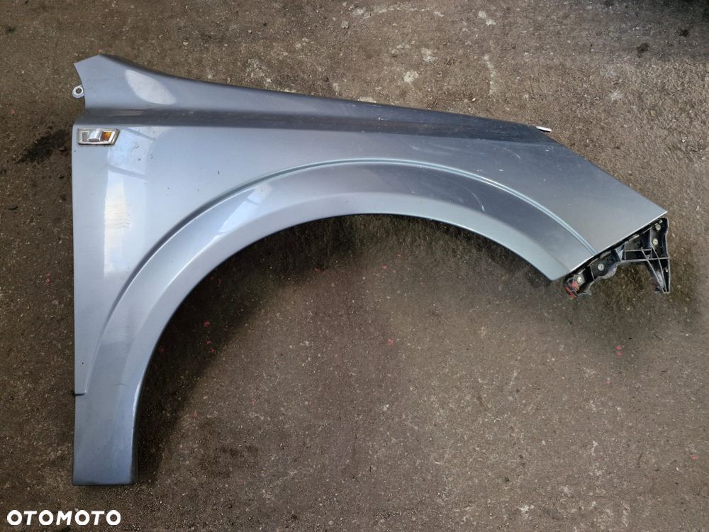 Błotnik prawy przedni przód Opel Astra H III Z163 oryginał - 1