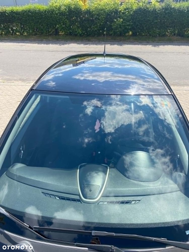 Opel Corsa 1.2 16V Cosmo - 7