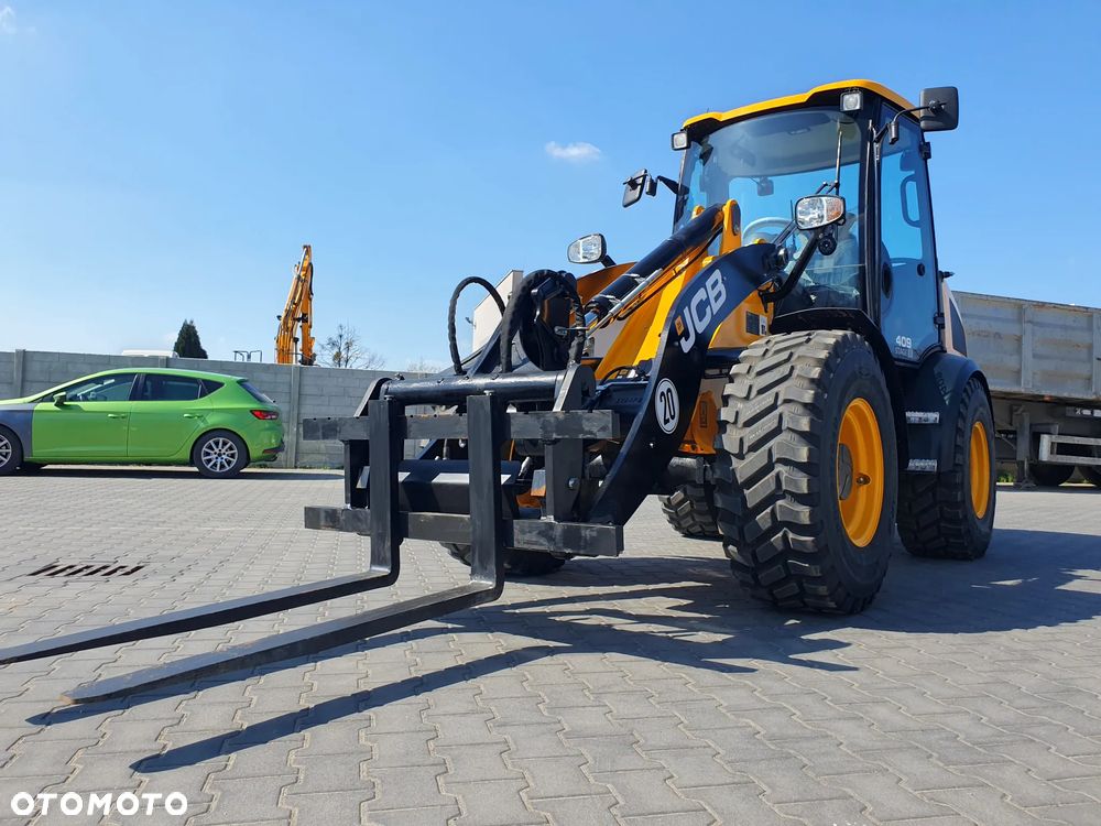 JCB 409 - 5