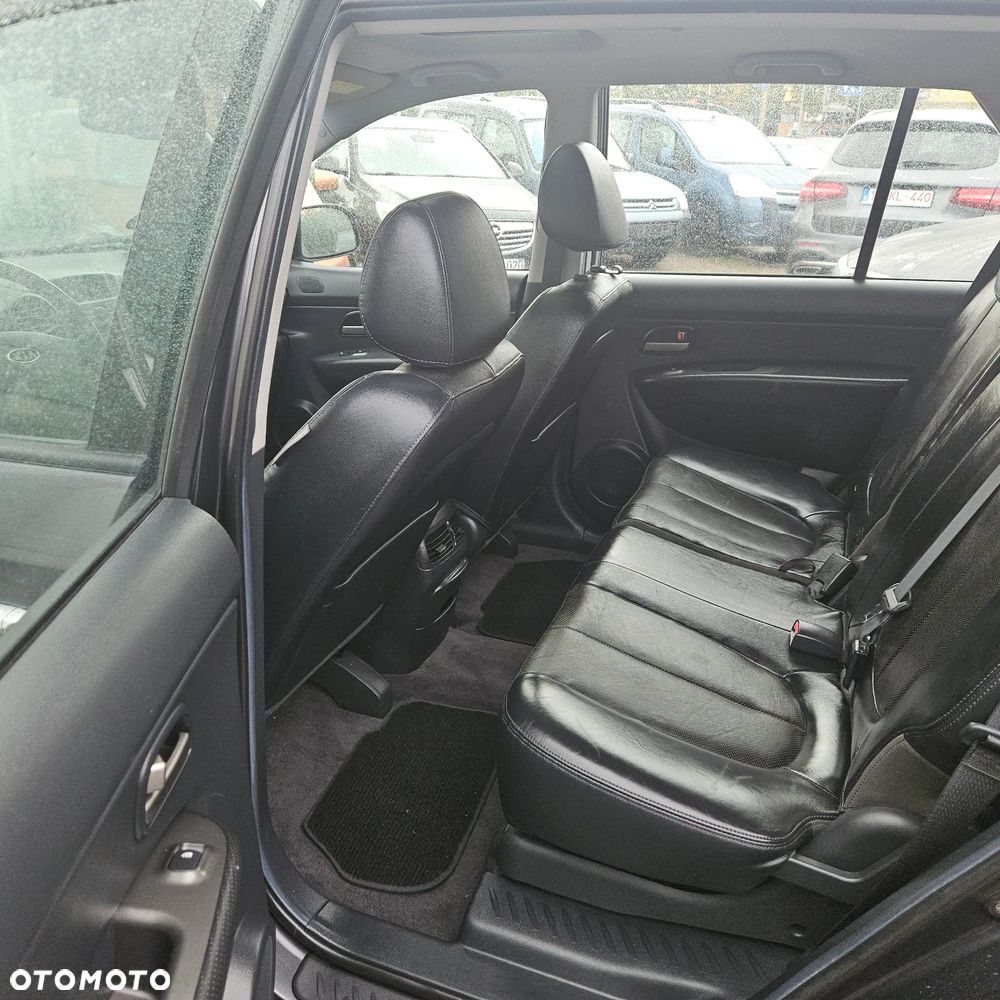 Kia Carens 2.0 CVVT LX Basis - 18