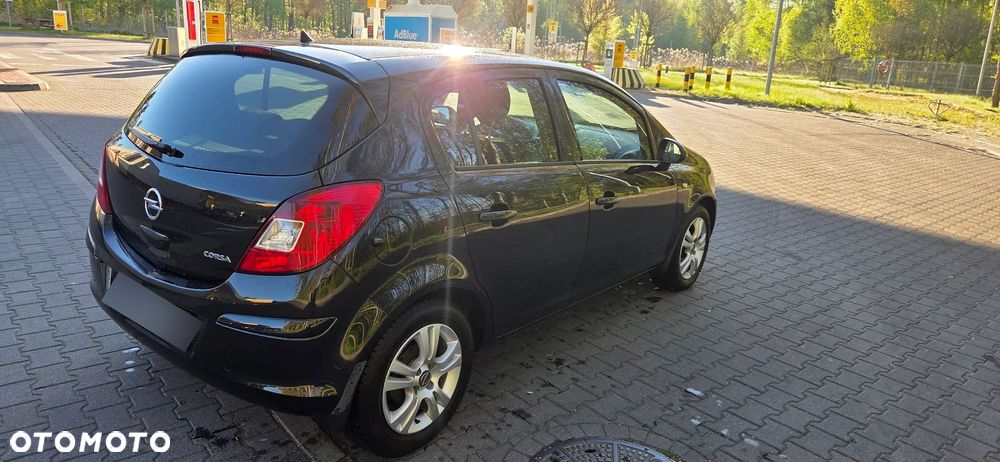 Opel Corsa 1.4 16V Enjoy - 6