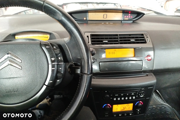 Citroen C4 I 04- zestaw wyswietlaczy -licznik -panel nawiewu -obrotomierz -ekran radia cena za komplet z foto.