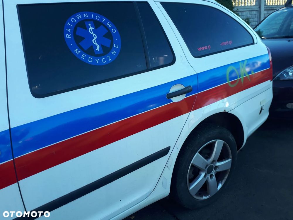 SKODA OCTAVIA II LIFT KOMBI 08-13 1.9 TDI OSŁONA PRZECIWSŁONECZNA PRAWA LEWA - 12