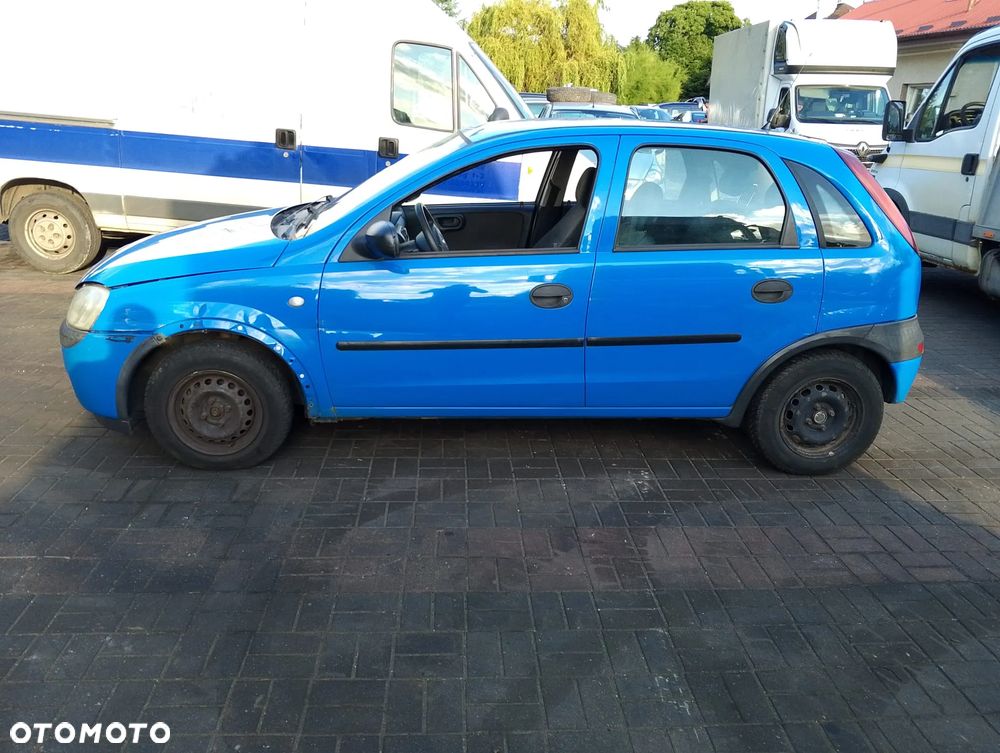 Opel Corsa C (02r.) 1.2 B 74KM. Silnik Z12XE Skrzynia F13BY lakier 20U.Cały na części. GWARANCJA !!! Przód Tył Zestaw Komplet Drzwi Klapa Zderzak Błotnik Maska Grill Atrapa Szyba Pas Lampa Lusterko Boczki Fotel Kanapa Kokpit Deska Rozdzielcza Przełącznik Włącznik Sterownik Przewody Wiązka Instalacja Moduł Komputer Czujnik Listwa Pompa Alternator Wtryski Głowica Rozrusznik Kompresor Sprzęgło Dwumas Silnik Skrzynia ABS Klimatyzacji Paliwa Wspomagania Kolektor Turbina Przepustnica Zawór Chłodnica Koło Hak Belka Sanki Zawieszenie Mcpherson Półoś Amortyzator Wydech Tłumik Zacisk Most - 5