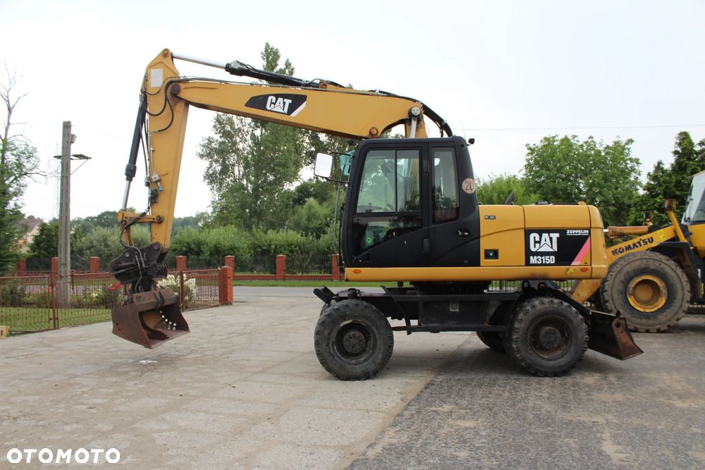 Caterpillar CAT M 315 D z Niemiec - 1