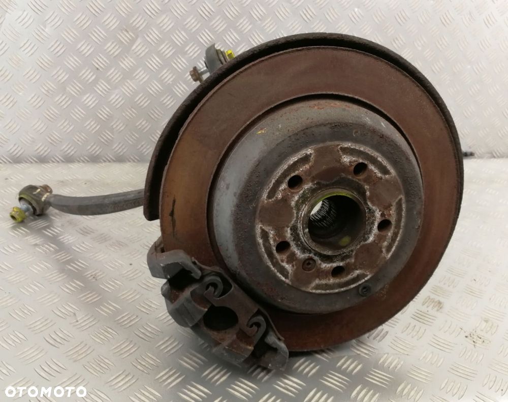 zacisk piasta zwrotnica wahacz lewa lewy tył MERCEDES W164 ML 3,0 CDI - 3