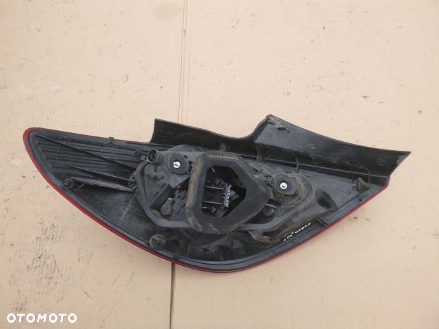 LAMPA PRAWY TYŁ PRAWA TYLNA OPEL CORSA D 06- - 6