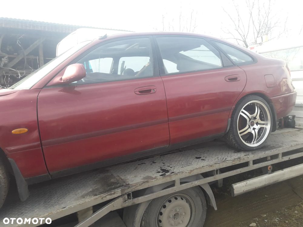 Mazda 323f MX-3 Xedos 6 9   1.8 2.0v6  Głowica Silnika wałek z wałki K8 KF - 14