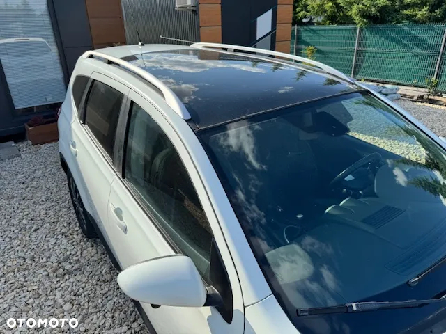 Nissan Qashqai+2 - 2