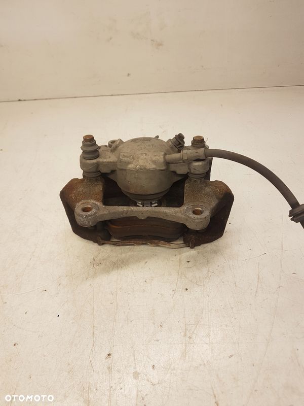ZACISK HAMULCOWY LEWY PRZÓD AUDI A4 B8 A5 8K0105K - 1