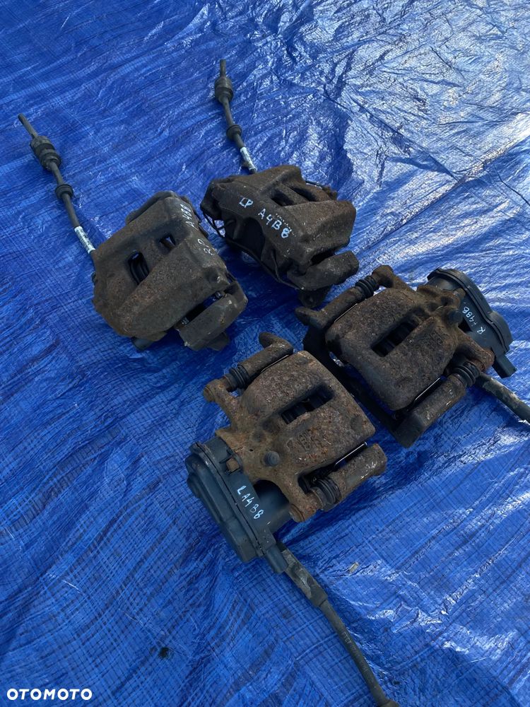 AUDI A4 B8 A5 8T Q5 2.0 TFSI ZACISK HAMULCOWY LEWY PRAWY TYŁ TYLNY KOMPLET  32335478 - 3