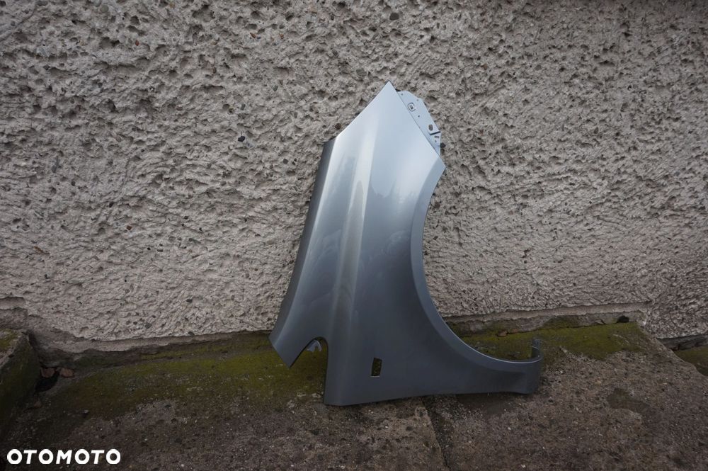 BŁOTNIK PRZEDNI PRAWY OPEL CORSA D Z179 - 2