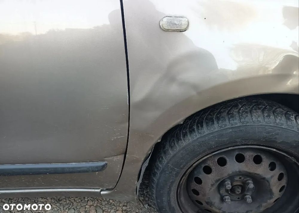 Nissan Note 2006 photo 4