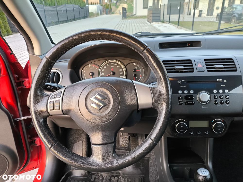 Suzuki Swift 1.3 Club - 9