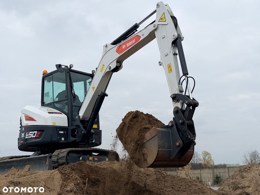 Bobcat Minikoparka Bobcat e50Z 5ton e55 e60 Cat 303.5 304  305 3xłyżki Ramię LOONG dodatkowe linie hydr wyjścia AUX1 + 2 przeciw waga MAX-dociążenie gąsienice 85% od nowości 1 właściciel z Niemiec Auto IDLEE po serwisie Widły wiertnica grabie i inne za dopłatą Szybkozłącze hydr Miller łyżka przedsiębierna Pług  Kubota Takeuchi Jcb - 8