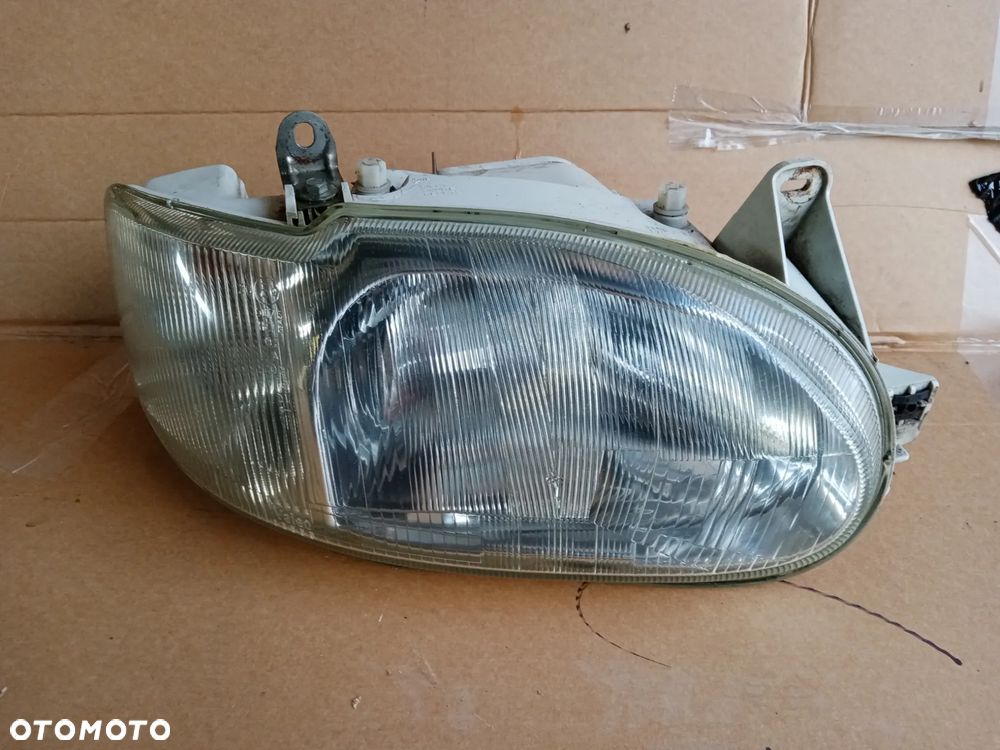Lampa prawy przód przednia prawa Ford Escort MK7 - 1