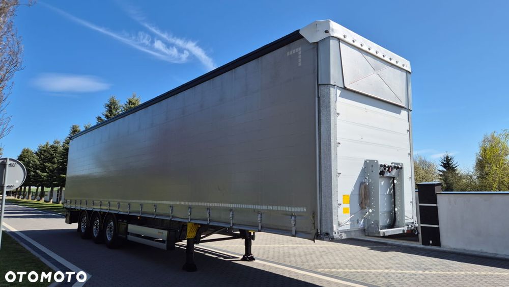 Schmitz Cargobull NACZEPA///SCHMITZ///2021///FIRANKA///MULDA 7.20///ALUFELGI///OŚ PODNOSZONA///ZBROJONA PLANDEKA///DACH PODNOSZONY///CERTYFIKAT XL///STAN BARDZO DOBRY - 2