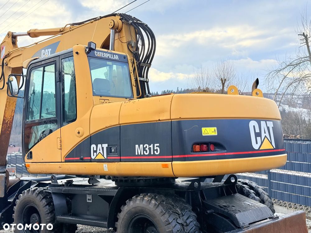 Caterpillar CAT M315C  CATERPILLAR SPROWADZONY  Bardzo Dobry Stan - 12
