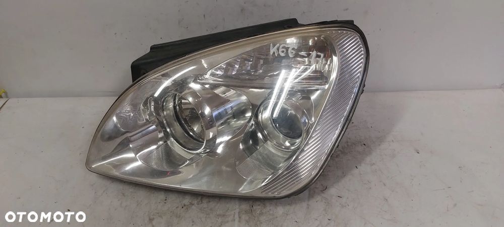 .  PRZOD PRZEDNIA LAMPA LEWA KIA CARENS 3 - 1