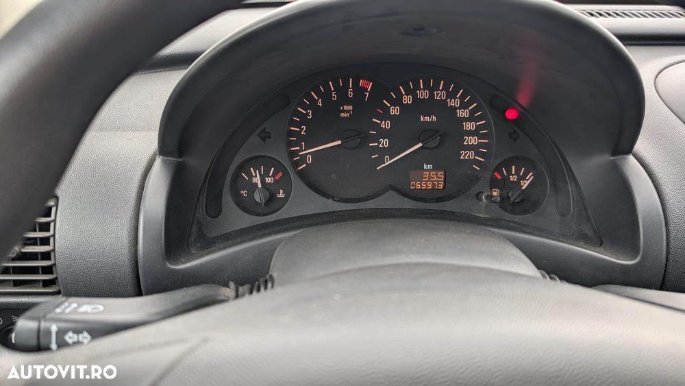 Opel Corsa 1.2i Enjoy - 9