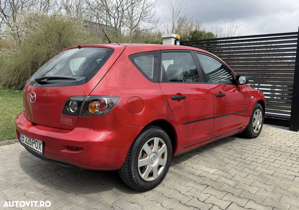Mazda 3 G100 Emotion - 4