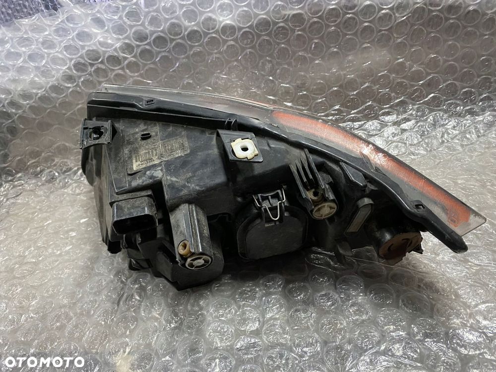 LAMPA PRAWA ZWYKŁA H7 BMW E90 USA 6942726-07 - 5