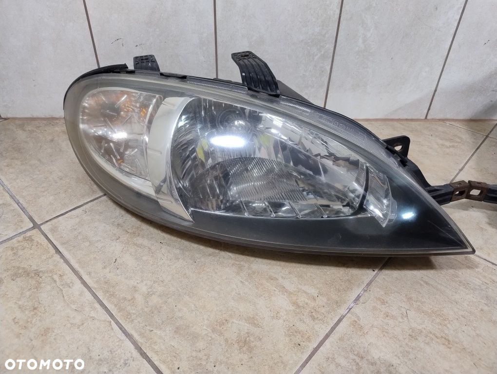 Chevrolet Lacetti lampa prawa lewa komplet Europa oryginał wysyłka - 2