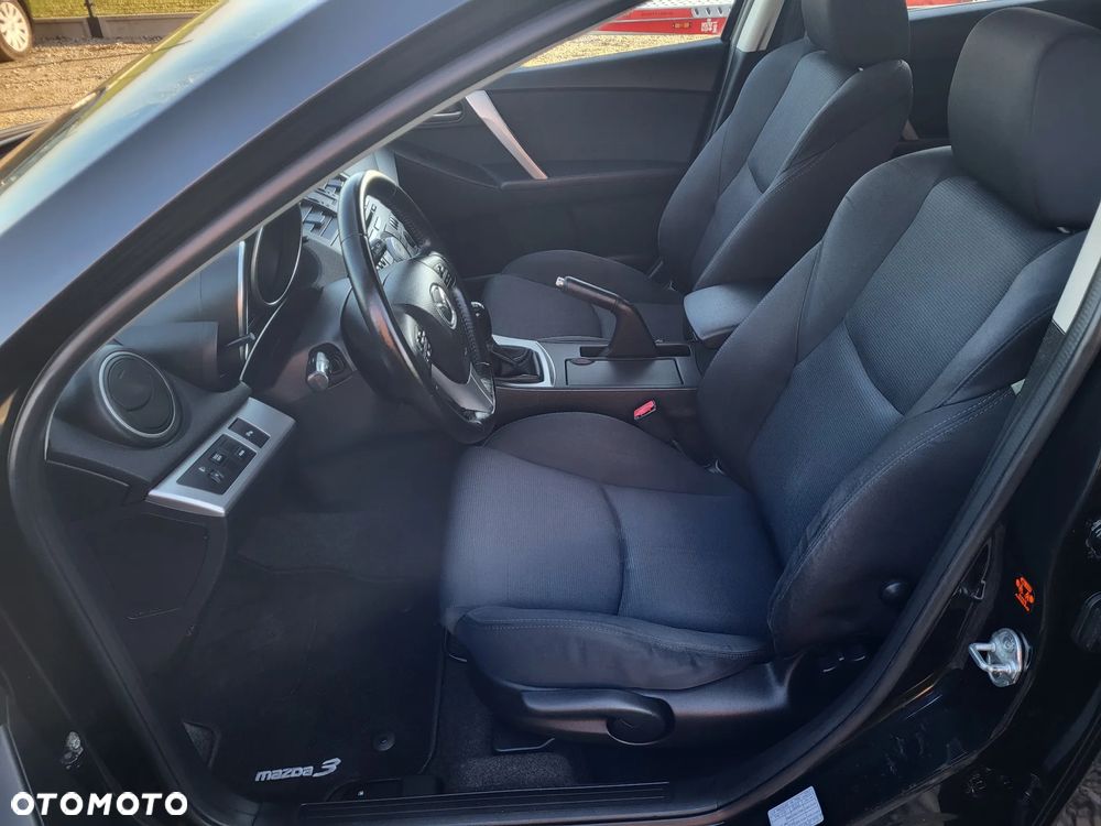 Mazda 3 1.6 Exclusive + - 12