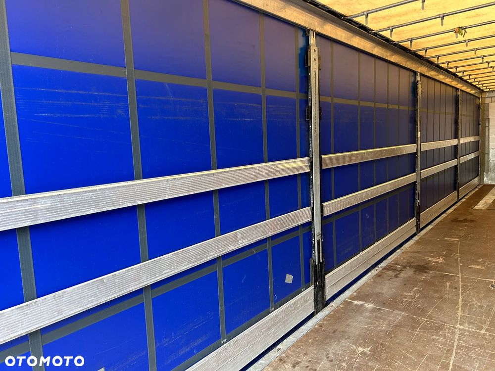 Schmitz Cargobull FIRANKA PODNOSZONY DACH NOWE PLANDEKI / 657 841 KM PRZEBIEGU / BARDZO ŁADNE OPONY / Z PEŁNYM WYPOSAŻENIEM DO ZAŁADUNKU / UCHWYTY PROMOWE / DOSTĘPNE 20 SZTUK KOLORY SREBRNY - NIEBIESKI - CZERWONY !! - 38
