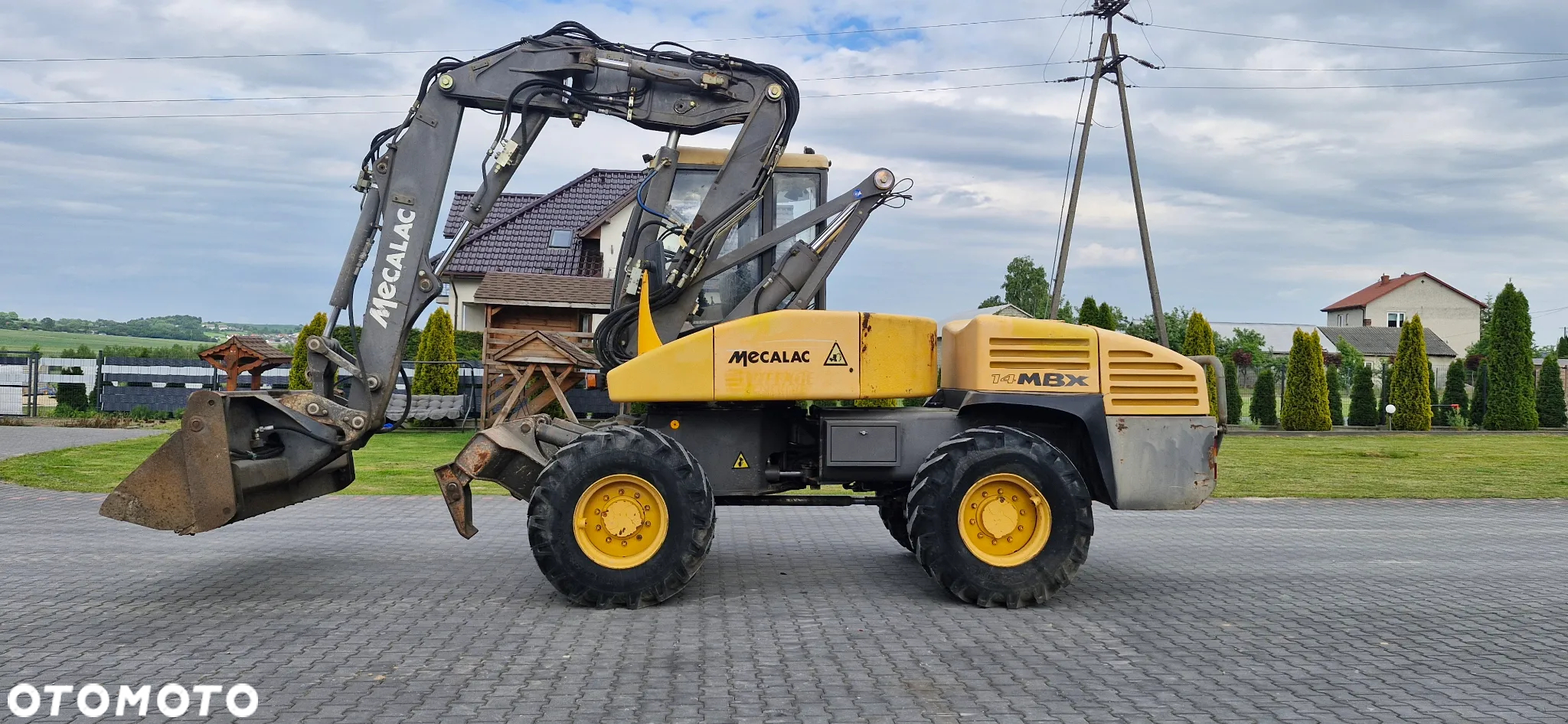 Mecalac 14MBX  Maszyna sprowadzona - 14